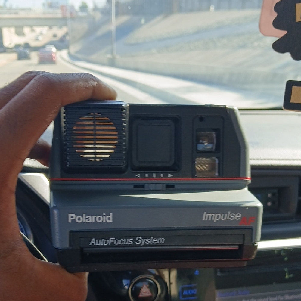 Polaroid impulse af autofocus instant film camera - retro vintage design - polar